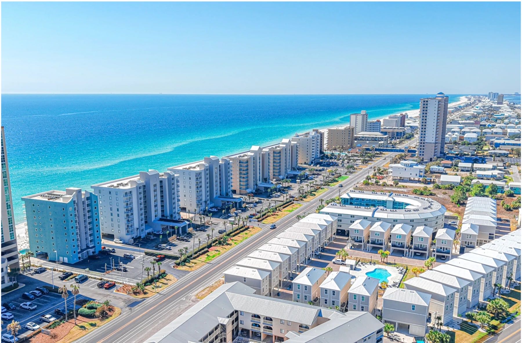 Aerial view of beachfront hotels and resort condos