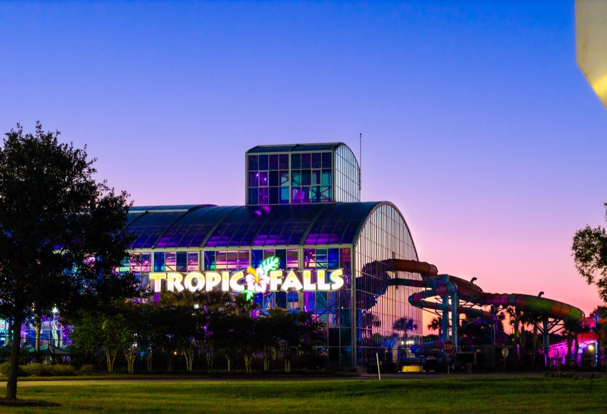 Tropic Falls waterpark illuminated at dusk