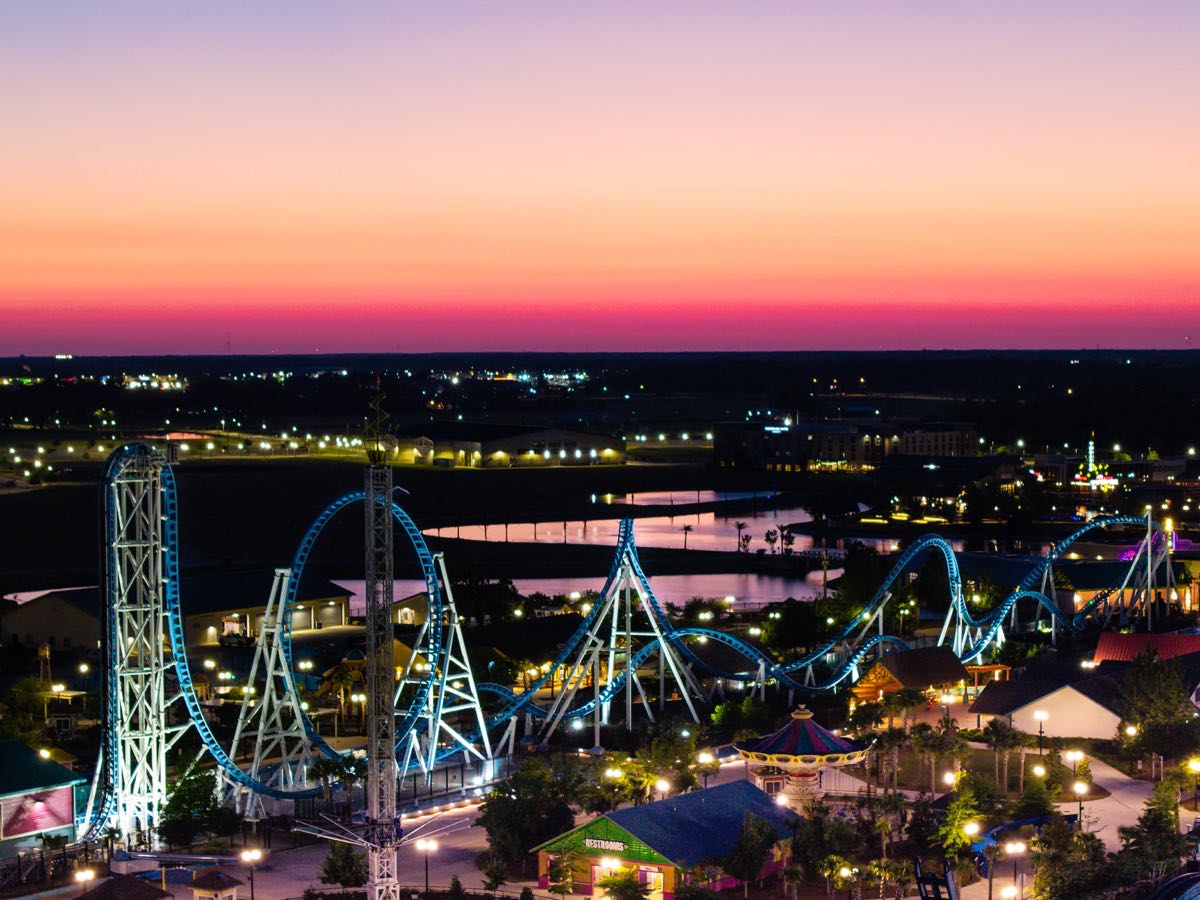 OWA amusement park illuminated at dusk